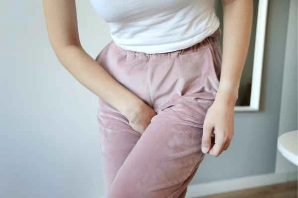 woman struggling with urine incontinence Wembley